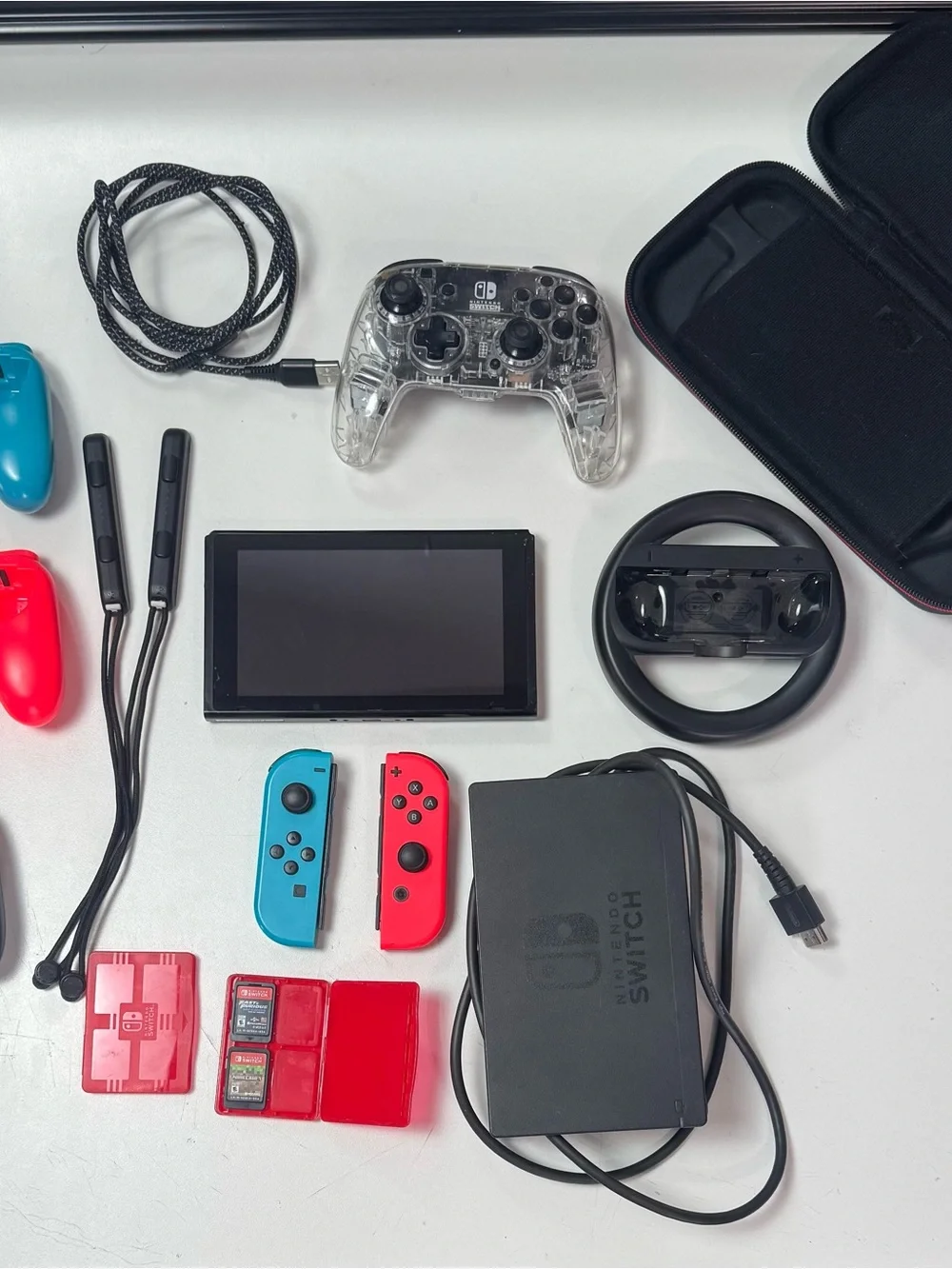 Nintendo Switch Console Bundle with Red & Blue Joy‑Con and Clear Pro Controller